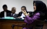 Evy Bersaksi di Sidang OC Kaligis
