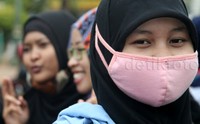 Aksi dilakukan di Hari Kerja Layak Sedunia (World Day of Decent Work).