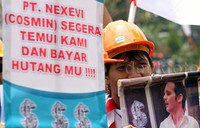 Massa membawa berbagai poster. Lamhot Aritonang/detikFoto.
