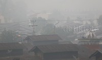 Kabut asap menyelimuti Padang.