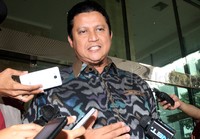 Mau diskusi, ada diskusi. (Soal) Pilkada berintegritas, kata Muhammad sembari berlalu masuk ke dalam gedung. Lamhot Aritonang/detikFoto.