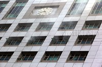 Asap tampak keluar dari lantai 13 gedung ini.