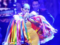 Bagaimana menurut Anda penampilan Syahrini kali ini? Pool/Noel/detikFoto.