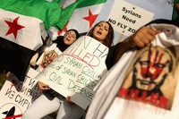 Mereka membawa poster dan meneriakan yel-yel. Chip Somodevilla/Getty Images/AFP.
