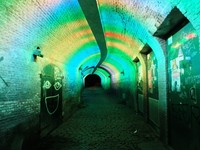 Salah satu titik Trajectum Lumen favorit wisatawan adalah Ganzenmarkt Tunnel. Terowongan ini dulu digunakan sebagai jalur kereta kuda untuk mengantar barang dagangan ke dalam wharves alias ruang penyimpanan (Sastri/detikTravel)