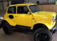 Hasil modifikasi ini digarap oleh Mayfair edition flavor. Hasilnya, mobil MINI menjadi mobil off-road. Istimewa/Ebay.