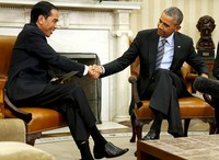 Jokowi berjabat tangan dengan Obama. Jonathan Ernst/Reuters/detikFoto.