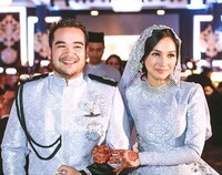 Asyraf dan Tya resmi menjadi pasangan suami-istri di Malaysia pada Minggu (1/11/2015). (Instagram/tyaarifinnw)