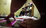 Menyulap Plastik Bekas Menjadi Payung