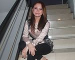 Senyum Manis Rossa yang Memesona