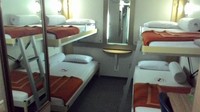 Ada juga kamar kelas 1B dengan 4 tempat tidur. Kamar ini ada di sisi dalam kapal yang tidak berjendela (Fitraya/detikTravel)