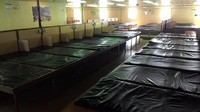 Suasana kelas ekonomi dengan deretan matras dan tanpa bantal. Tentu kamar ini tidak senyaman kelas 1 dan 2 (Fitraya/detikTravel)