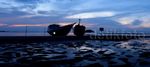 Kapal Pinisi Hiasi Senja di Pantai Tanjung Pendam