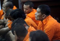 Polisi menangkap 10 orang sindikat buku KIR aspal ini. Pool/Rengga Sancaya/detikFoto.