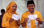 Calon Wakil Walkot Depok Nyoblos Bareng Istri