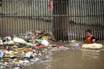 Petugas Bersihkan Sampah di Kali Baru