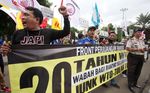 Kritisi Kebijakan WTO