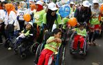 Penyandang Disabilitas Ramaikan Jalan Sehat HUT BRI