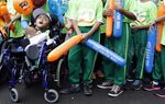 Penyandang Disabilitas Ramaikan Jalan Sehat HUT BRI