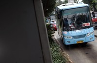 Bus feeder melintas di Jalan Buncit Raya Jakarta Selatan.