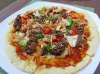 Pizza bulgogi kimchi memiliki aroma khas yang berasal dari wijen dan shoyu. Hmm, gurih!