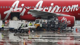 Penumpang AirAsia dari Singapura Dibawa ke Terminal Domestik