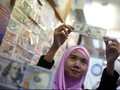 Rupiah Dibuka Rp14.357 per Dolar AS, Hari ini Diramal Melemah