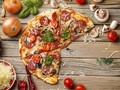 Cara Makan Pizza Bisa Menggambarkan Kepribadian Anda