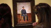 Self Portrait with Cropped Hair. Demikian judul lukisan yang dibuat Frida Kahlo. Karya seni khas Frida digambarkan oleh inisiator utama gerakan surealis André Breton sebagai “sumbu bom.” (REUTERS/Rebecca Cook)