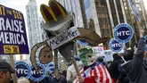 Program Presiden AS Barack Obama untuk mendorong kenaikan upah minimum hingga US$10,10 (Rp130 ribu) per jam mendapat halangan dari Partai Republik yang konservatif. (Reuters/Shannon Stapleton)