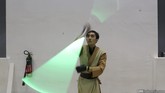 Anggota komunitas pencinta Star Wars dengan kostum Anakin Skywalker dan lightsaber alias pedang cahaya beraksi di salah satu pentas di Comic Con 2015 Jakarta.
