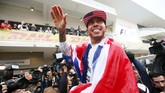 Di GP Amerika Serikat, 25 Oktober lalu, Hamilton menggondol gelar juara dunia ketiganya. Ia menyamai rekor pebalap idolanya dari Brasil, Ayrton Senna. (Reuters/Hoch Zwei)