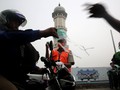 Gojek dan Grab Klaim Bagikan Masker Gratis tapi Terbatas