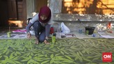 Citra menambahkan, minimnya sentuhan seni di luar kafe dan bangunan itu membuat Cikini dianggap biasa saja. Penambahan seni mural di trotoar diharapkan bisa mengubah hal itu. (CNN Indonesia/Adhi Wicaksono)