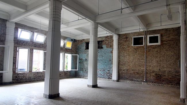 Alasan di Balik Bata Telanjang Gedung OLVEH