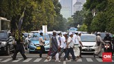 Demonstran anti Partai Komunis Indonesia sempat membuat macet jalanan. (CNN Indonesia/Adhi Wicaksono).