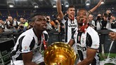 Dalam empat musimnya bersama Juventus, Pogba selalu mendapatkan gelar Serie-A. Ia bermain total 124 kali di Serie-A dengan mencetak 28 gol. (Giuseppe Bellini/Getty Images)