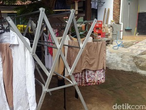 Jangan Jemur Baju di Depan Rumah, Ini 5 Risikonya