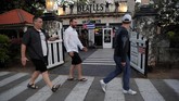Menjadi penggemar the Beatles di Kuba bukan perkara mudah. Negara komunis itu melarang seluruh bentuk kebudayaan Barat, termasuk musik the Beatles, tapi itu dahulu. (AFP PHOTO / YAMIL LAGE)