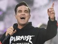 Jatuh Bangun Robbie Williams Hadapi Gangguan Mentalnya