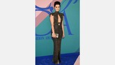Tampil elegan tapi tak membosankan, Jaimie Alexander hadir di CFDA tahun ini dengan mengenakan gaun Marc Bouwer yang membuatnya betah disorot kamera. (Dimitrios Kambouris/Getty Images/AFP)