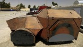Bom mobil ini juga dipandang para militan sebagai senjata paling efektif untuk menahan gempuran pasukan keamanan karena daya ledaknya yang besar. (REUTERS/Thaier Al-Sudani)