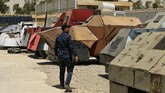 Kini, penggunaan bom mobil menjadi cara umum yang digunakan militan dan pemberontak di Timur Tengah. (REUTERS/Thaier Al-Sudani)