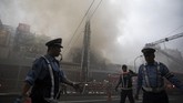 Juni lalu, gubernur Tokyo mengumumkan rencana untuk memindahkan Tsukiji dari lokasi laris turis ini. (AFP Photo/Behrouz Mehri)