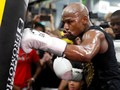 Mike Tyson Tak Ingin Lihat Mayweather Jr. Tampil di UFC