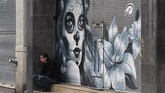 Tak hanya menghibur, seni mural ini biasanya punya muatan lain, seringkali berisi representasi situasi politik dan sosial Meksiko sepanjang sejarah. (AFP/Alfredo Estrella)