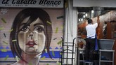 Tak hanya di jalanan, seni mural Mexico juga bisa ditemukan di perpustakaan, tembok bangunan hingga stasiun kereta. (AFP/Alfredo Estrella)