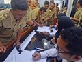 Besaran Gaji PNS Golongan IIA, Janji Jokowi ke Perangkat Desa