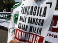 Kebangkitan 'Hantu PKI' dan Komitmen Penyelesaian Tragedi 65