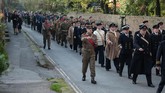 Bagi warga sekitar The North Yorkshire Moors Railways, Pickering, Inggris utara, pertengahan Oktober menjadi momen khusus bagi mereka mengenang masa-masa Perang Dunia II. (AFP PHOTO / Oli SCARFF)